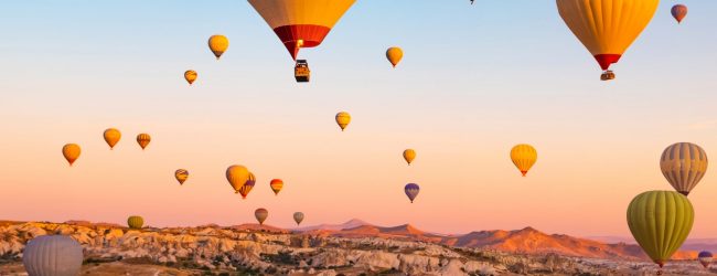 Bright hot air balloons in sky of Cappadocia, Turkey