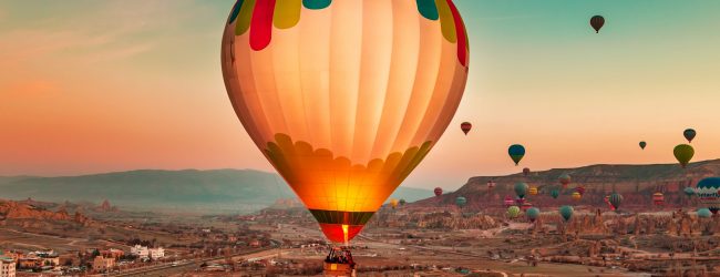 Magnificent dawn with hot air balloons.